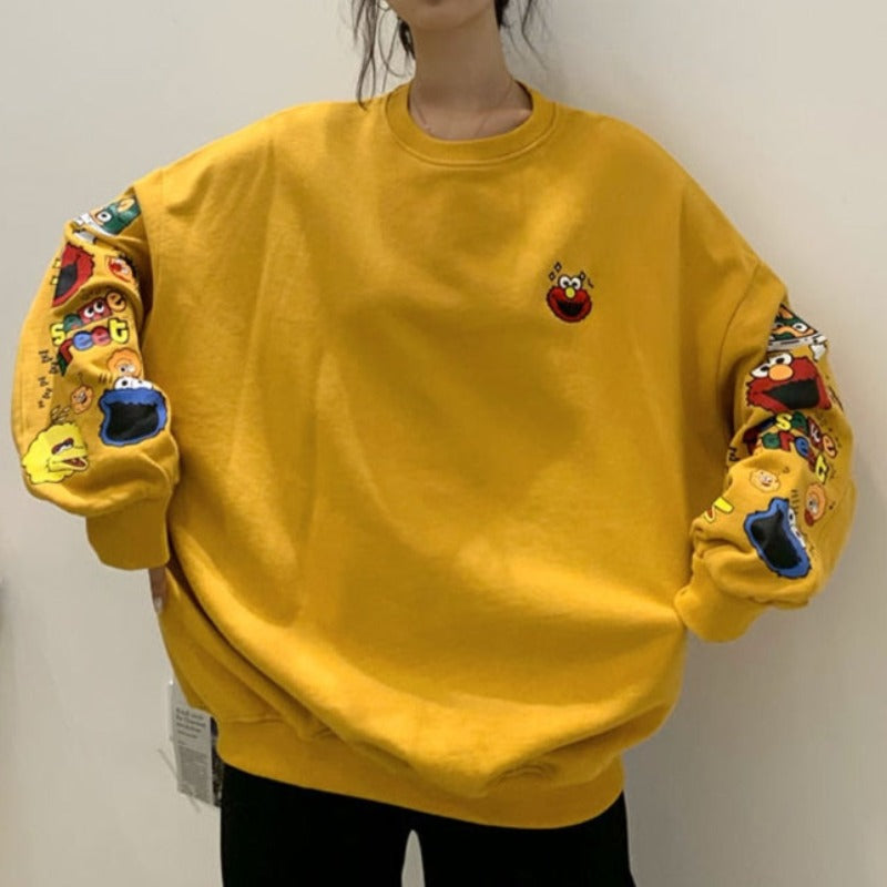 Damska bluza crewneck z nadrukami z ulicy sezamkowej