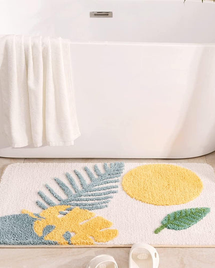 Mata łazienkowa z motywem liści