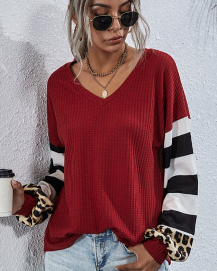 Damska koszulka oversize z długim rękawem w paski