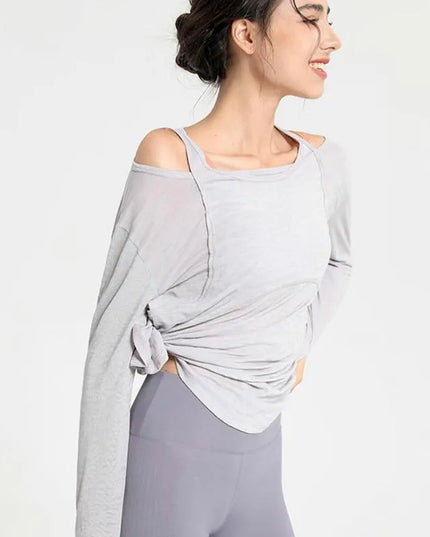 Sportowa koszulka damska z długim rękawem o luźnym kroju