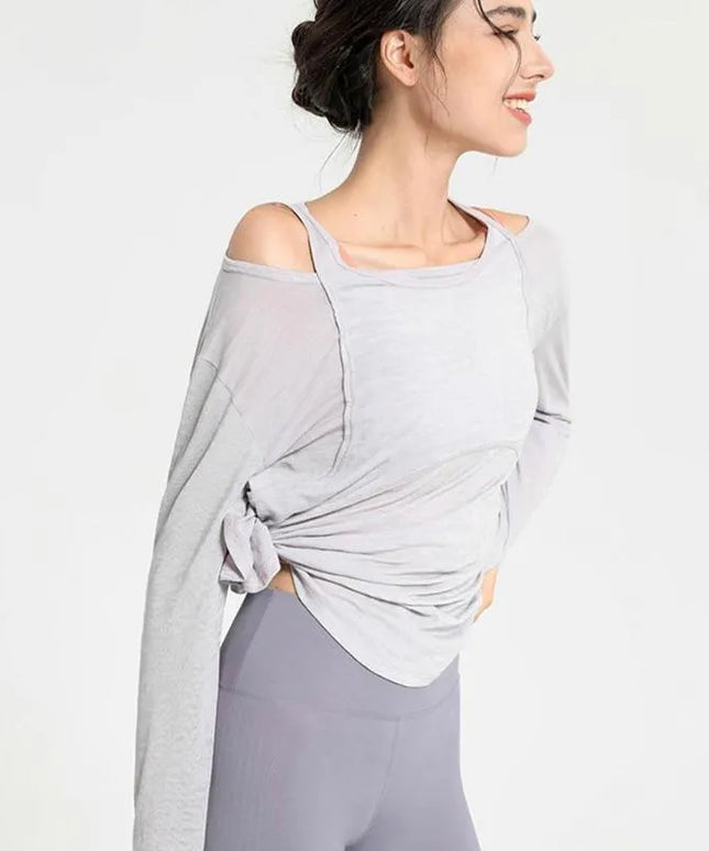 Sportowa koszulka damska z długim rękawem o luźnym kroju