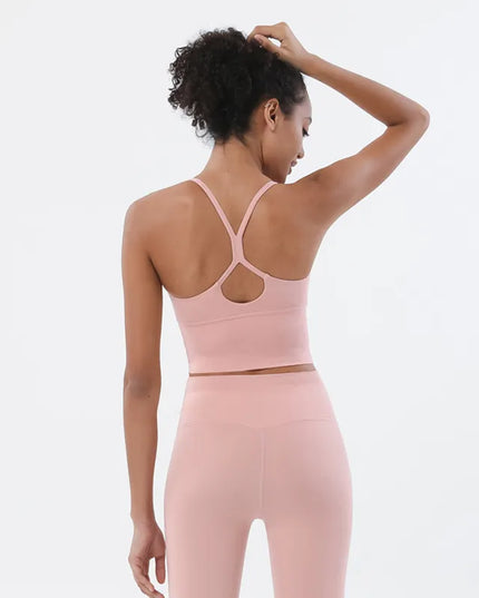 Sportowy top damski na cienkich ramiączkach z wyjmowanymi miseczkami