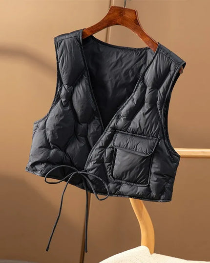 Kamizelka damska z krótkim stanem wiązana w pasie