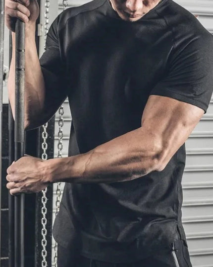 Sportowa koszulka męska jednokolorowa z przedłużanym tyłem