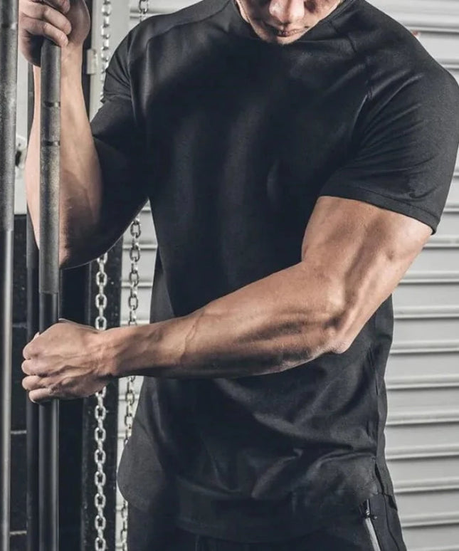 Sportowa koszulka męska jednokolorowa z przedłużanym tyłem