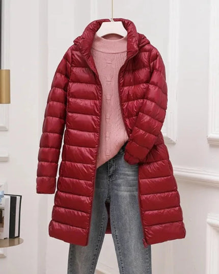 Długa damska pikowana kurtka zimowa z kapturem