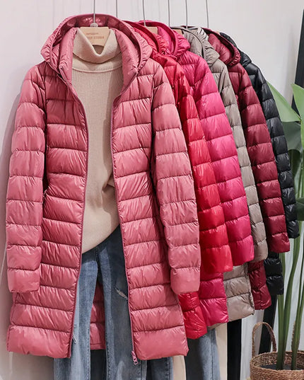 Długa damska pikowana kurtka zimowa z kapturem