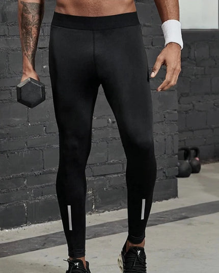 Sportowe legginsy męskie elastyczne o klasycznym kroju