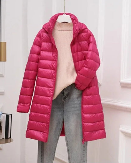 Długa damska pikowana kurtka zimowa z kapturem