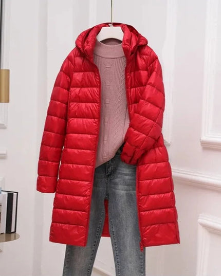 Długa damska pikowana kurtka zimowa z kapturem