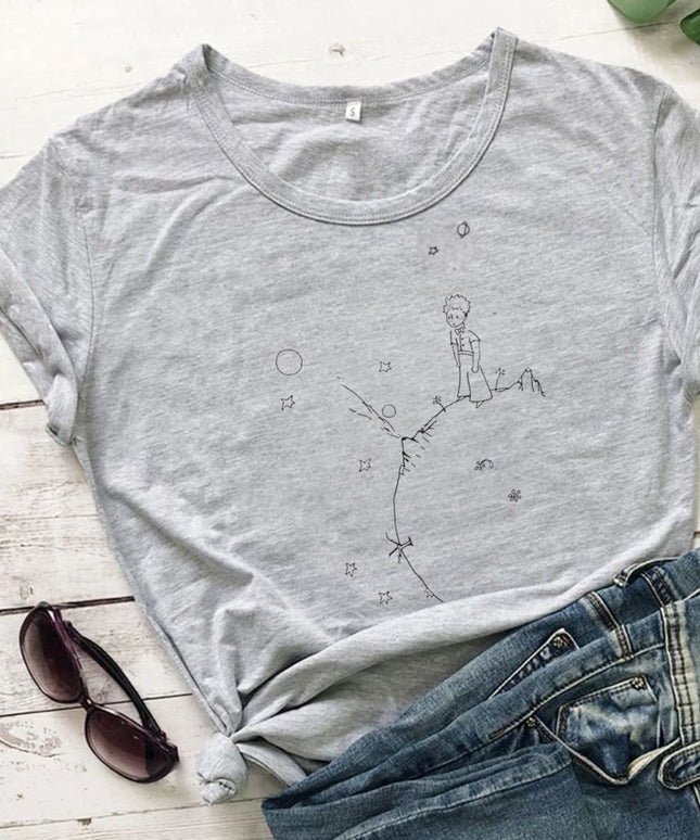 Damski T-shirt z delikatnym wzorem Małego Księcia