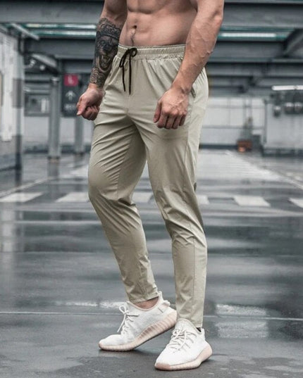 Sportowe dresy męskie elastyczne ze zwężaną nogawką