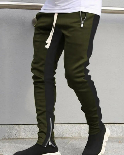 Sportowe dresy męskie z ozdobnym lampasem i suwakiem na nogawce