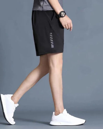 Sportowe spodenki męskie przed kolano - elastyczne i szybkoschnące