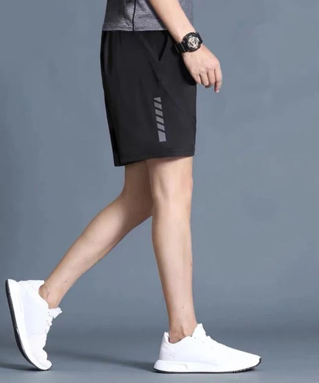 Sportowe spodenki męskie przed kolano - elastyczne i szybkoschnące