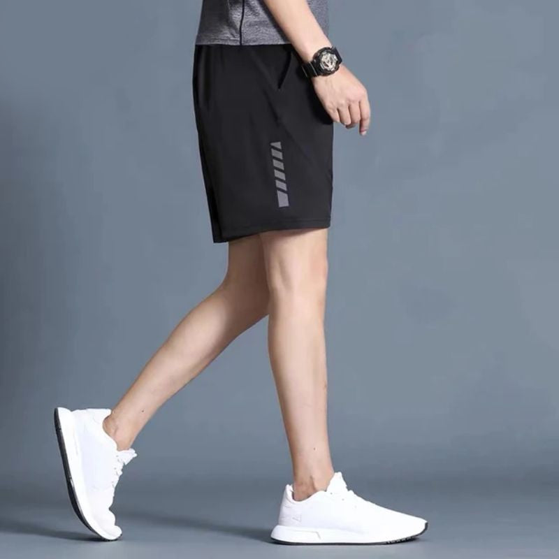 Sportowe spodenki męskie przed kolano - elastyczne i szybkoschnące