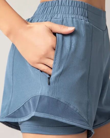 Sportowe szorty damskie z kieszenią i gumką w pasie