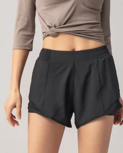 Sportowe szorty damskie z kieszenią i gumką w pasie
