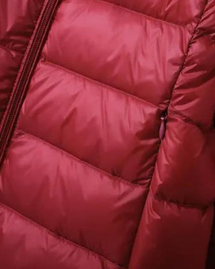 Długa damska pikowana kurtka zimowa z kapturem