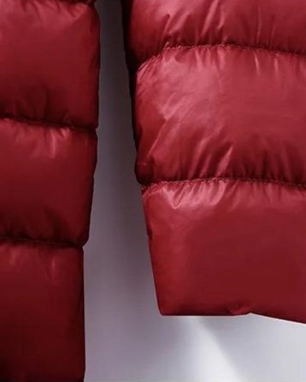 Długa damska pikowana kurtka zimowa z kapturem