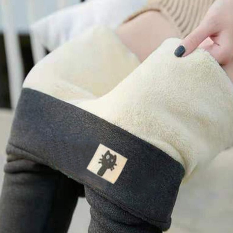 Damskie zimowe legginsy ocieplane z naszywką