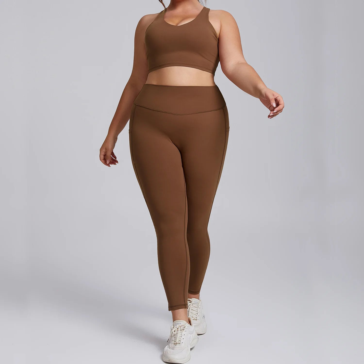 Komplet sportowy damski plus size - bezszwowe legginsy i top