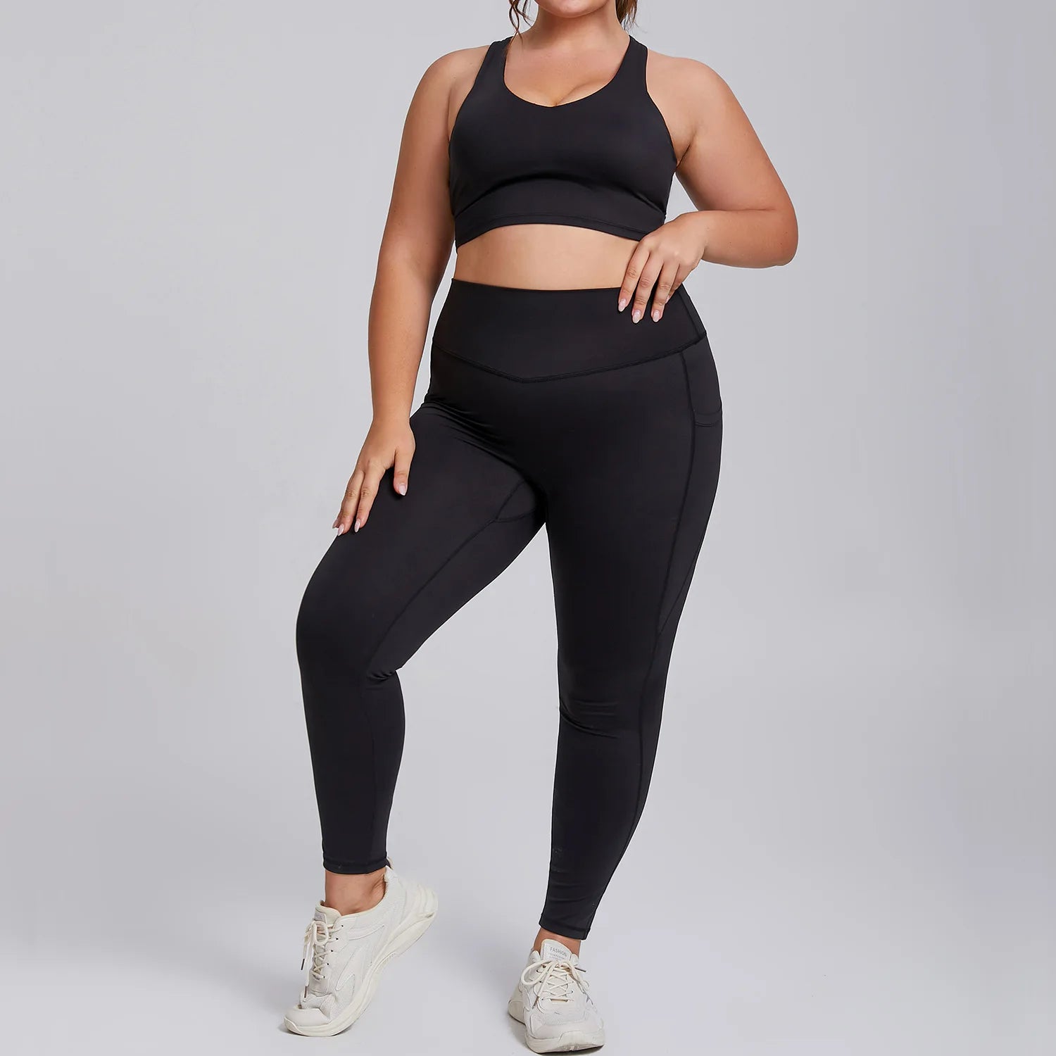 Komplet sportowy damski plus size - bezszwowe legginsy i top