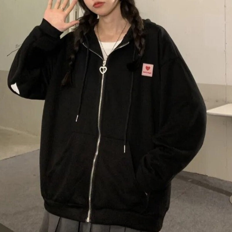 Damska bluza oversize z motywem w serca