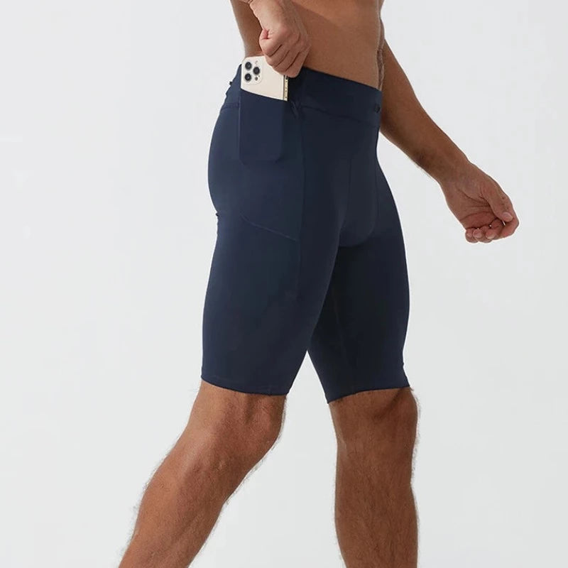 Sportowe legginsy męskie krótkie z kieszeniami