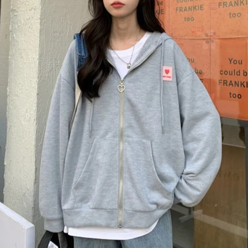 Damska bluza oversize z motywem w serca