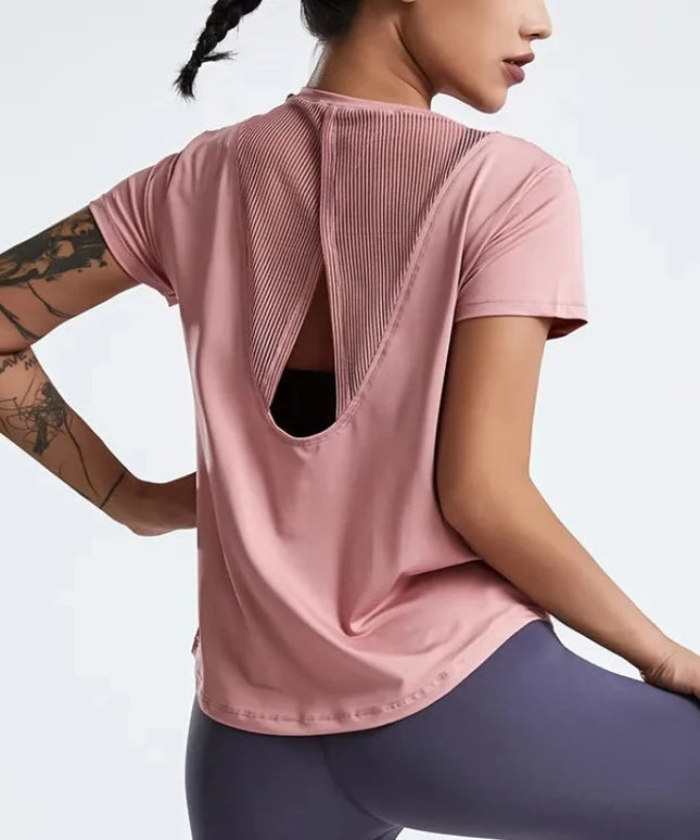 Sportowa koszulka damska z rozcięciem i siateczką na plecach