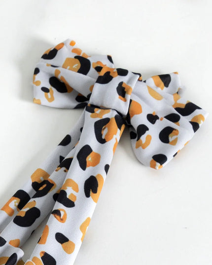 Jednoczęściowy strój kąpielowy w panterkę dla dziewczynki