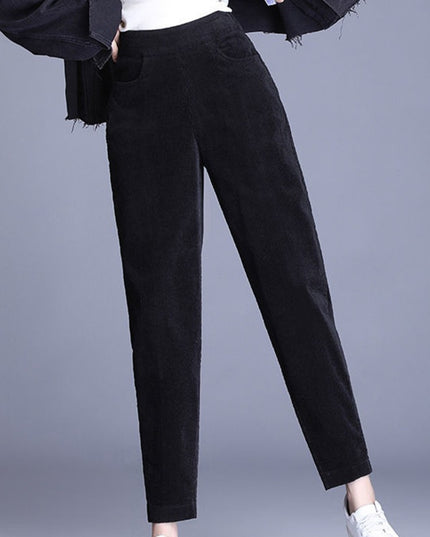 Damskie zimowe spodnie sztruksowe z futerkiem od środka