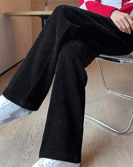 Damskie spodnie zimowe z szeroką nogawką ocieplane