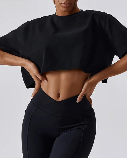 Sportowy top damski o luźnym kroju z krótkim rękawem