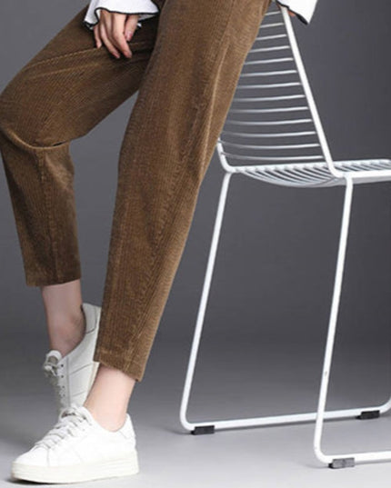 Damskie zimowe spodnie sztruksowe z futerkiem od środka