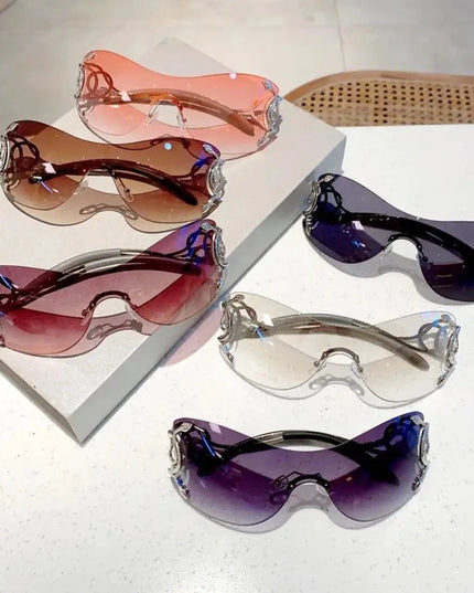 Damskie okulary przeciwsłoneczne bezramkowe z ozdobnymi zausznikami