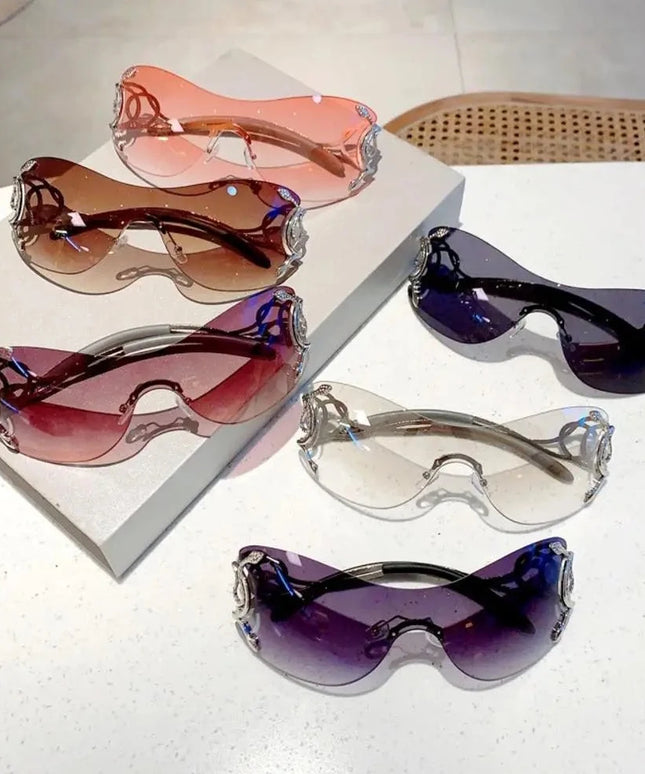 Damskie okulary przeciwsłoneczne bezramkowe z ozdobnymi zausznikami