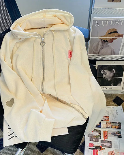 Damska bluza oversize z motywem w serca