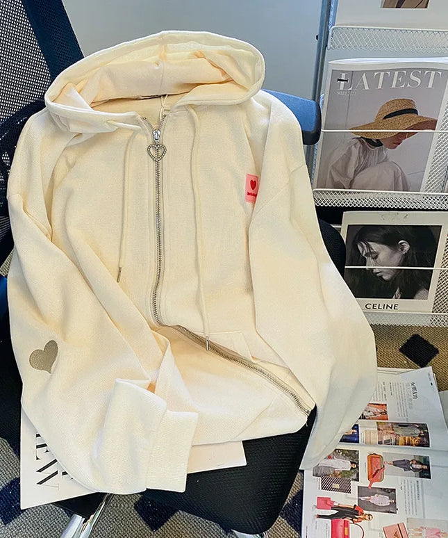 Damska bluza oversize z motywem w serca