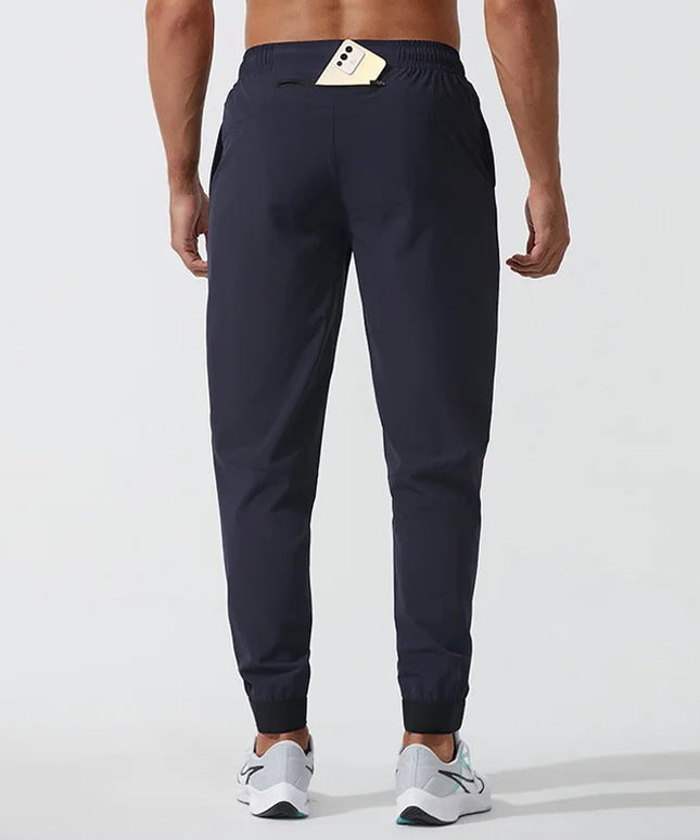 Sportowe dresy męskie elastyczne z dodatkową kieszonką