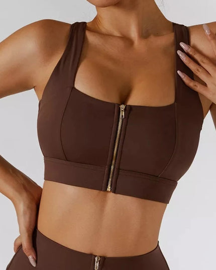 Sportowy komplet damski ozdobiony suwakiem