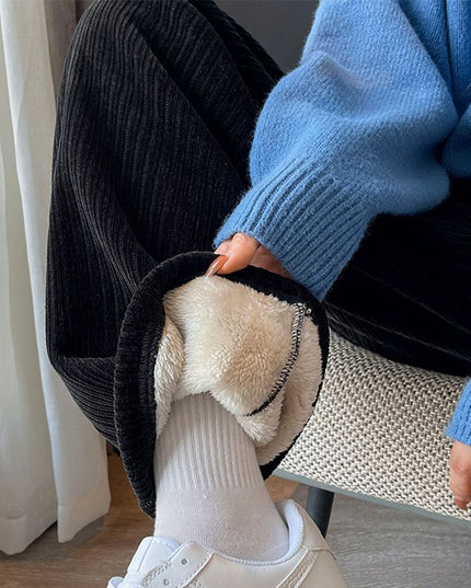 Damskie spodnie zimowe z szeroką nogawką ocieplane