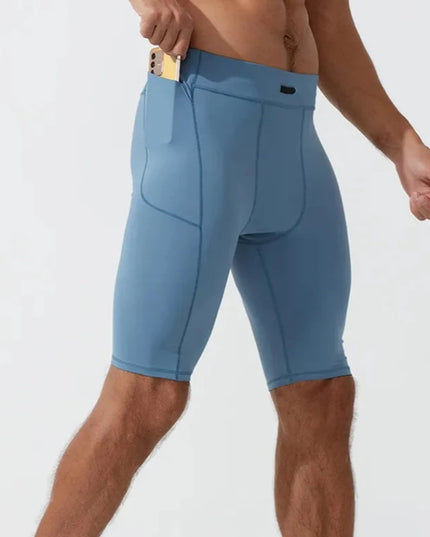 Sportowe legginsy męskie krótkie z kieszeniami