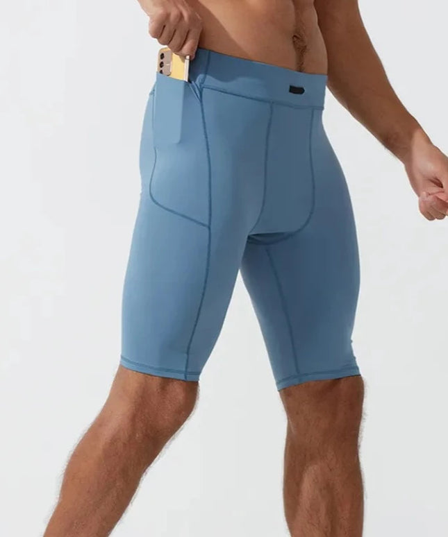 Sportowe legginsy męskie krótkie z kieszeniami