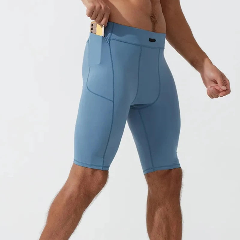 Sportowe legginsy męskie krótkie z kieszeniami