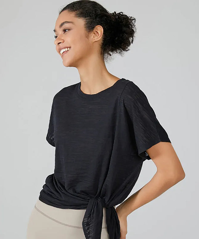 Sportowa koszulka damska o luźnym kroju z możliwością zawiązania