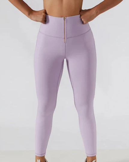 Sportowe legginsy damskie push up z suwakiem z przodu