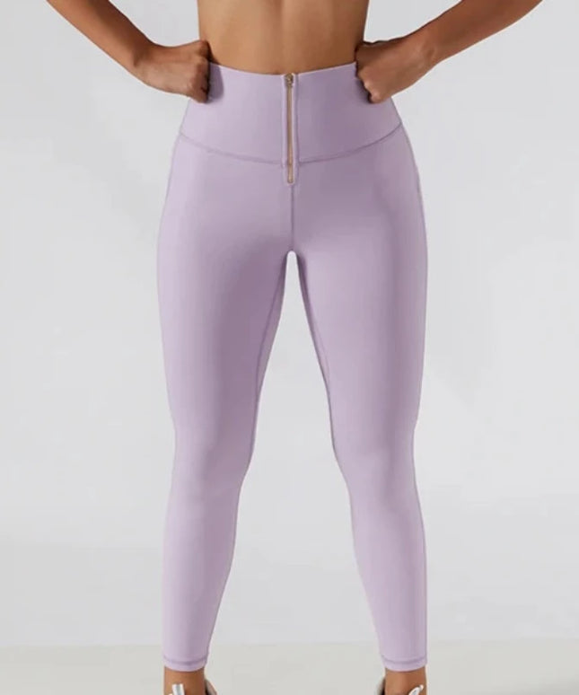 Sportowe legginsy damskie push up z suwakiem z przodu