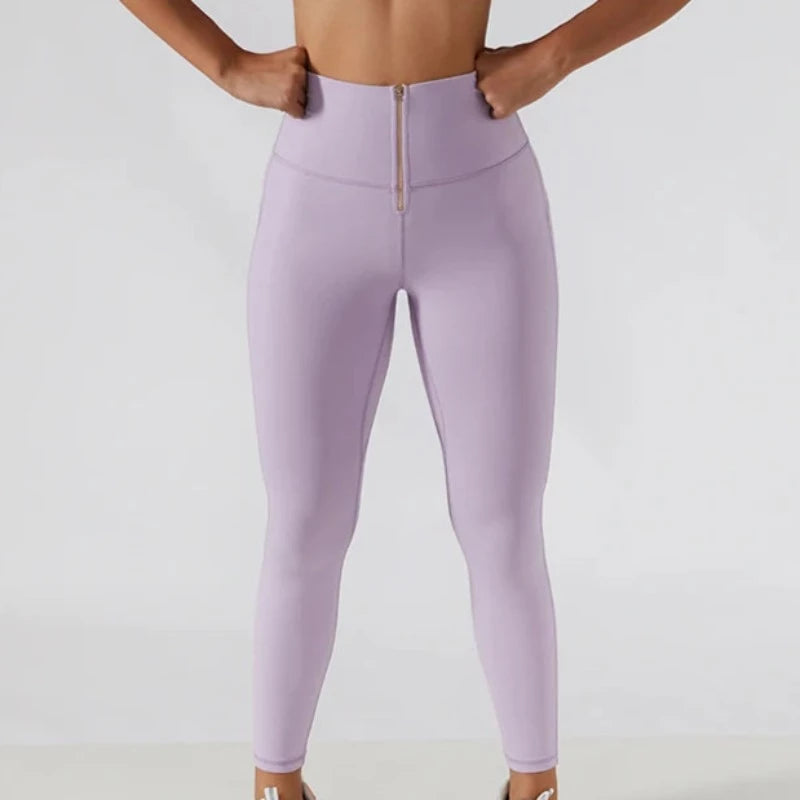 Sportowe legginsy damskie push up z suwakiem z przodu